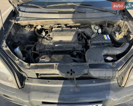 Черный Хендай Туксон, объемом двигателя 1.98 л и пробегом 218 тыс. км за 9350 $, фото 11 на Automoto.ua