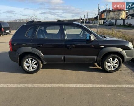 Черный Хендай Туксон, объемом двигателя 1.98 л и пробегом 218 тыс. км за 9350 $, фото 1 на Automoto.ua