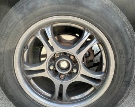 Чорний Хендай Туксон, об'ємом двигуна 2 л та пробігом 260 тис. км за 5500 $, фото 11 на Automoto.ua