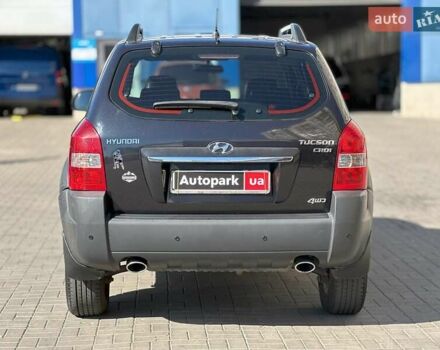Черный Хендай Туксон, объемом двигателя 2 л и пробегом 255 тыс. км за 9290 $, фото 4 на Automoto.ua