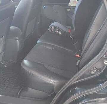 Черный Хендай Туксон, объемом двигателя 2 л и пробегом 141 тыс. км за 8500 $, фото 1 на Automoto.ua