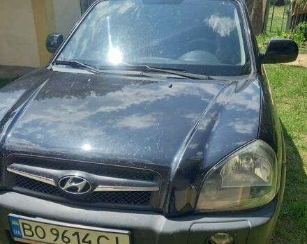 Черный Хендай Туксон, объемом двигателя 1.98 л и пробегом 220 тыс. км за 8500 $, фото 5 на Automoto.ua