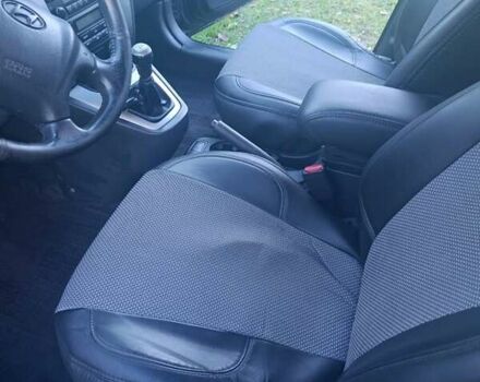 Черный Хендай Туксон, объемом двигателя 1.98 л и пробегом 298 тыс. км за 9300 $, фото 8 на Automoto.ua