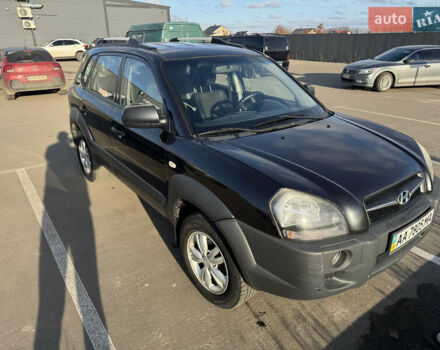 Черный Хендай Туксон, объемом двигателя 1.98 л и пробегом 218 тыс. км за 9350 $, фото 15 на Automoto.ua