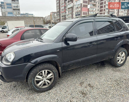 Черный Хендай Туксон, объемом двигателя 2 л и пробегом 175 тыс. км за 8000 $, фото 1 на Automoto.ua