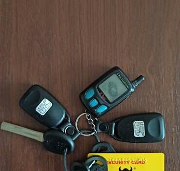 Черный Хендай Туксон, объемом двигателя 1.98 л и пробегом 186 тыс. км за 9500 $, фото 16 на Automoto.ua