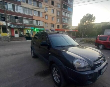 Черный Хендай Туксон, объемом двигателя 2 л и пробегом 290 тыс. км за 8500 $, фото 1 на Automoto.ua