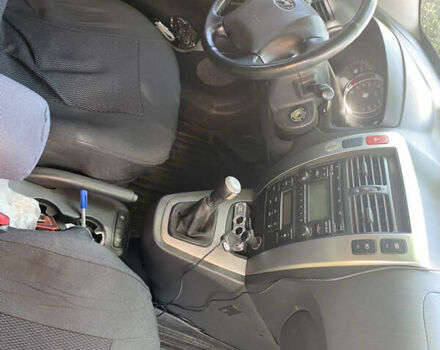 Черный Хендай Туксон, объемом двигателя 1.98 л и пробегом 245 тыс. км за 9000 $, фото 5 на Automoto.ua