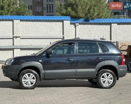 Черный Хендай Туксон, объемом двигателя 2 л и пробегом 255 тыс. км за 9290 $, фото 6 на Automoto.ua