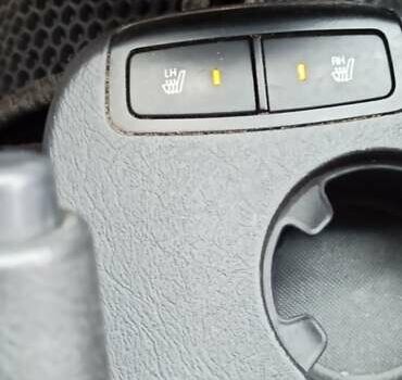 Черный Хендай Туксон, объемом двигателя 1.98 л и пробегом 186 тыс. км за 9500 $, фото 12 на Automoto.ua