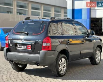 Черный Хендай Туксон, объемом двигателя 2 л и пробегом 255 тыс. км за 9290 $, фото 3 на Automoto.ua