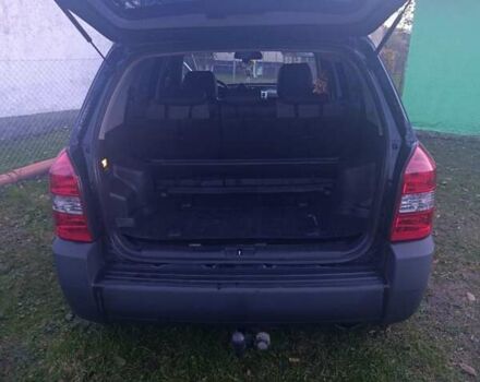 Черный Хендай Туксон, объемом двигателя 1.98 л и пробегом 298 тыс. км за 9300 $, фото 6 на Automoto.ua