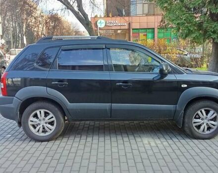 Черный Хендай Туксон, объемом двигателя 1.98 л и пробегом 298 тыс. км за 9300 $, фото 16 на Automoto.ua