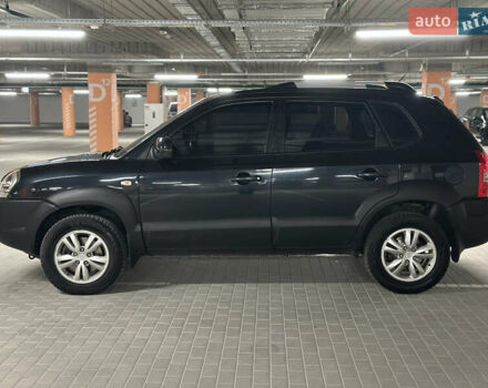 Черный Хендай Туксон, объемом двигателя 1.98 л и пробегом 129 тыс. км за 10600 $, фото 7 на Automoto.ua