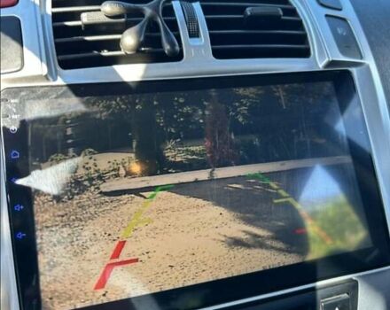 Черный Хендай Туксон, объемом двигателя 1.98 л и пробегом 186 тыс. км за 9500 $, фото 11 на Automoto.ua