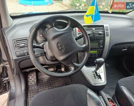 Чорний Хендай Туксон, об'ємом двигуна 1.98 л та пробігом 253 тис. км за 8500 $, фото 8 на Automoto.ua