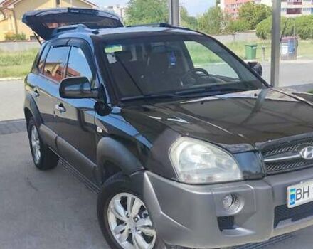 Черный Хендай Туксон, объемом двигателя 2 л и пробегом 141 тыс. км за 8500 $, фото 6 на Automoto.ua