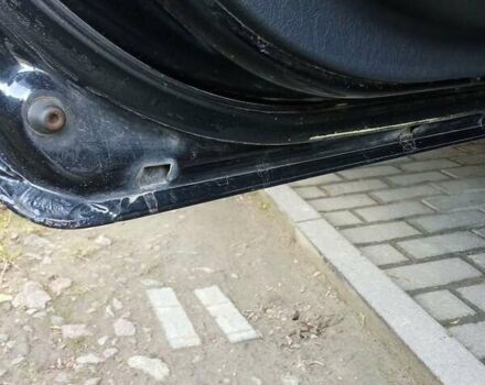 Черный Хендай Туксон, объемом двигателя 1.98 л и пробегом 298 тыс. км за 9300 $, фото 24 на Automoto.ua