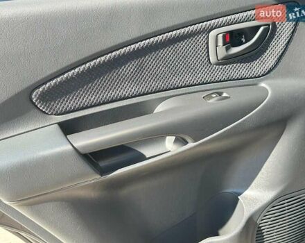 Черный Хендай Туксон, объемом двигателя 2 л и пробегом 255 тыс. км за 9290 $, фото 14 на Automoto.ua