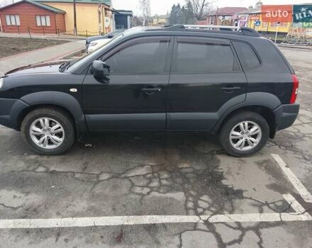 Черный Хендай Туксон, объемом двигателя 1.98 л и пробегом 214 тыс. км за 9100 $, фото 10 на Automoto.ua