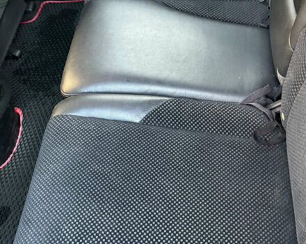 Черный Хендай Туксон, объемом двигателя 1.98 л и пробегом 218 тыс. км за 9350 $, фото 8 на Automoto.ua