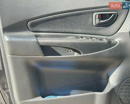 Черный Хендай Туксон, объемом двигателя 2 л и пробегом 255 тыс. км за 9290 $, фото 9 на Automoto.ua