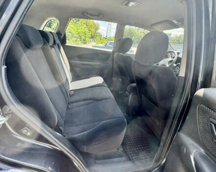 Черный Хендай Туксон, объемом двигателя 1.98 л и пробегом 252 тыс. км за 7999 $, фото 14 на Automoto.ua