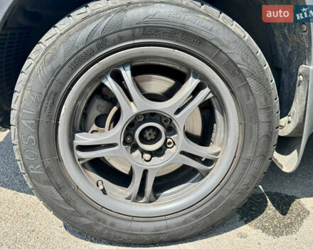 Черный Хендай Туксон, объемом двигателя 1.98 л и пробегом 252 тыс. км за 7999 $, фото 8 на Automoto.ua