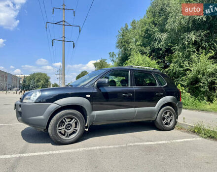 Черный Хендай Туксон, объемом двигателя 1.98 л и пробегом 252 тыс. км за 7999 $, фото 3 на Automoto.ua