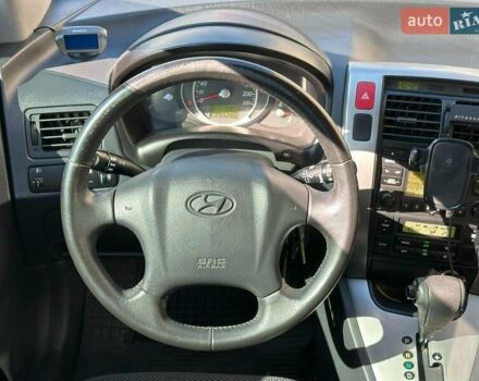 Черный Хендай Туксон, объемом двигателя 2 л и пробегом 255 тыс. км за 9290 $, фото 17 на Automoto.ua