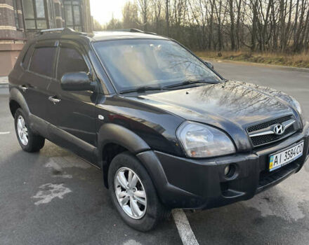 Чорний Хендай Туксон, об'ємом двигуна 1.98 л та пробігом 180 тис. км за 7950 $, фото 3 на Automoto.ua