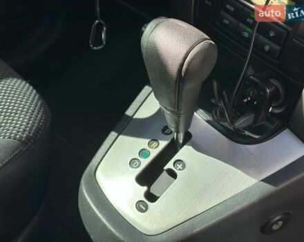 Черный Хендай Туксон, объемом двигателя 2 л и пробегом 255 тыс. км за 9290 $, фото 23 на Automoto.ua