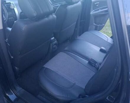 Черный Хендай Туксон, объемом двигателя 1.98 л и пробегом 298 тыс. км за 9300 $, фото 5 на Automoto.ua