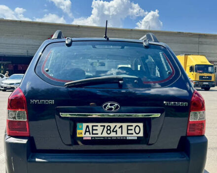 Черный Хендай Туксон, объемом двигателя 1.98 л и пробегом 252 тыс. км за 7999 $, фото 5 на Automoto.ua