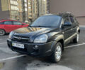 Чорний Хендай Туксон, об'ємом двигуна 1.98 л та пробігом 180 тис. км за 7950 $, фото 1 на Automoto.ua