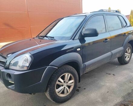 Чорний Хендай Туксон, об'ємом двигуна 2 л та пробігом 387 тис. км за 7000 $, фото 7 на Automoto.ua