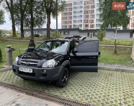Черный Хендай Туксон, объемом двигателя 1.98 л и пробегом 312 тыс. км за 8500 $, фото 8 на Automoto.ua