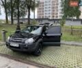 Черный Хендай Туксон, объемом двигателя 1.98 л и пробегом 312 тыс. км за 8500 $, фото 8 на Automoto.ua