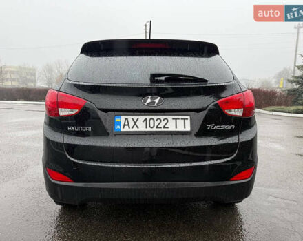 Черный Хендай Туксон, объемом двигателя 2.4 л и пробегом 143 тыс. км за 12000 $, фото 13 на Automoto.ua