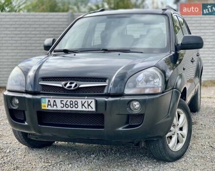 Черный Хендай Туксон, объемом двигателя 1.98 л и пробегом 158 тыс. км за 8200 $, фото 25 на Automoto.ua
