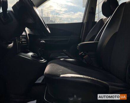 Черный Хендай Туксон, объемом двигателя 2 л и пробегом 178 тыс. км за 9600 $, фото 9 на Automoto.ua