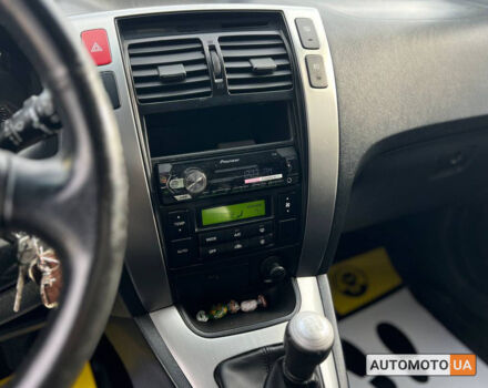 Черный Хендай Туксон, объемом двигателя 2 л и пробегом 178 тыс. км за 9600 $, фото 15 на Automoto.ua