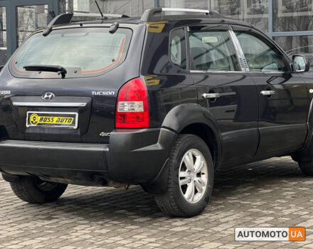 Черный Хендай Туксон, объемом двигателя 2 л и пробегом 178 тыс. км за 9600 $, фото 5 на Automoto.ua