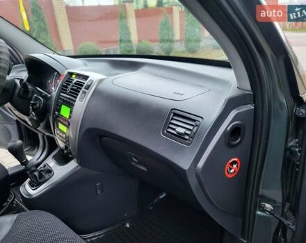 Чорний Хендай Туксон, об'ємом двигуна 1.98 л та пробігом 160 тис. км за 10300 $, фото 106 на Automoto.ua