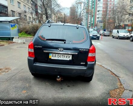 Черный Хендай Туксон, объемом двигателя 2 л и пробегом 258 тыс. км за 9000 $, фото 3 на Automoto.ua
