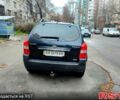 Черный Хендай Туксон, объемом двигателя 2 л и пробегом 258 тыс. км за 9000 $, фото 3 на Automoto.ua