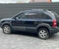 Черный Хендай Туксон, объемом двигателя 2 л и пробегом 181 тыс. км за 11000 $, фото 1 на Automoto.ua