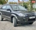 Черный Хендай Туксон, объемом двигателя 1.98 л и пробегом 158 тыс. км за 8200 $, фото 24 на Automoto.ua