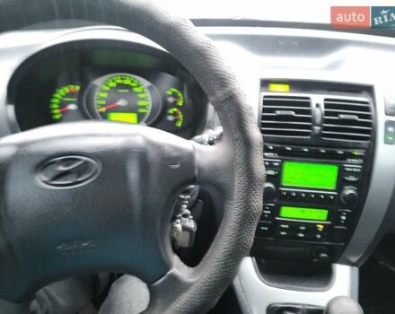 Чорний Хендай Туксон, об'ємом двигуна 1.98 л та пробігом 160 тис. км за 10300 $, фото 127 на Automoto.ua