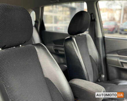 Черный Хендай Туксон, объемом двигателя 2 л и пробегом 178 тыс. км за 9600 $, фото 18 на Automoto.ua